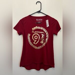 Harry Potter tshirt. Maroon with gold metallic trains and words. Size YL.